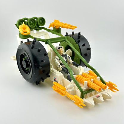 Toy model of a vehicle with green, yellow, and black colors on a white background