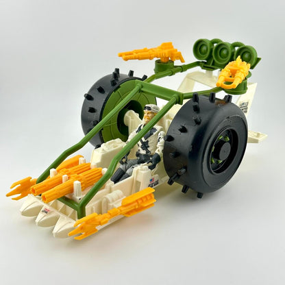 Toy vehicle with green and yellow details on a white background