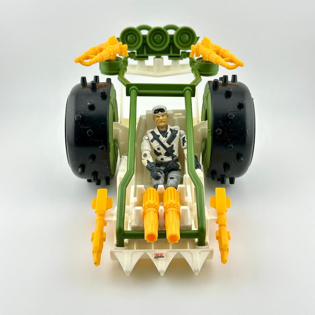 Toy vehicle with a figure inside on a white background