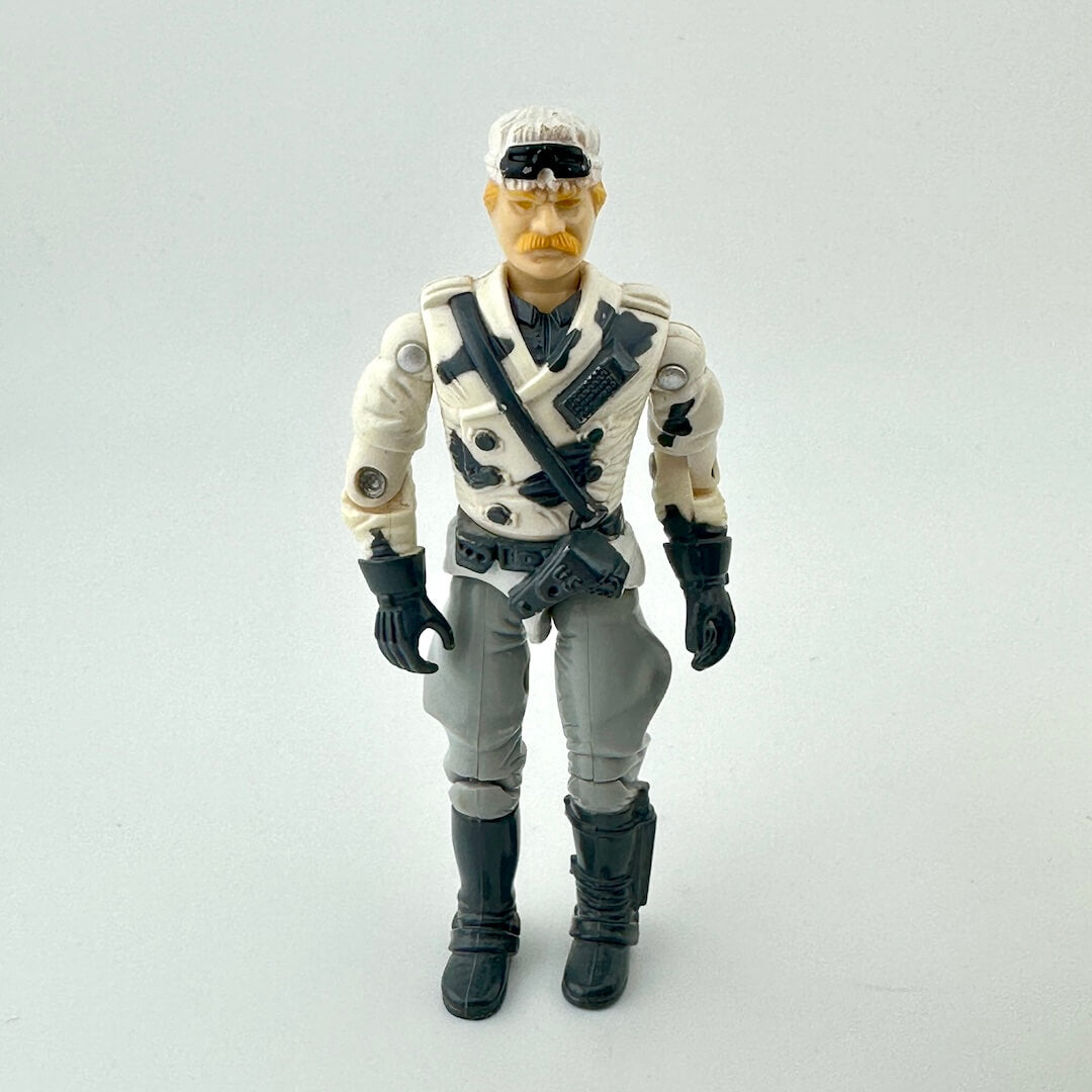 Action figure in tactical gear on a white background