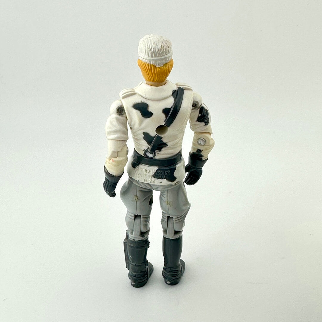 Action figure in a white and gray outfit with black accents on a light gray background