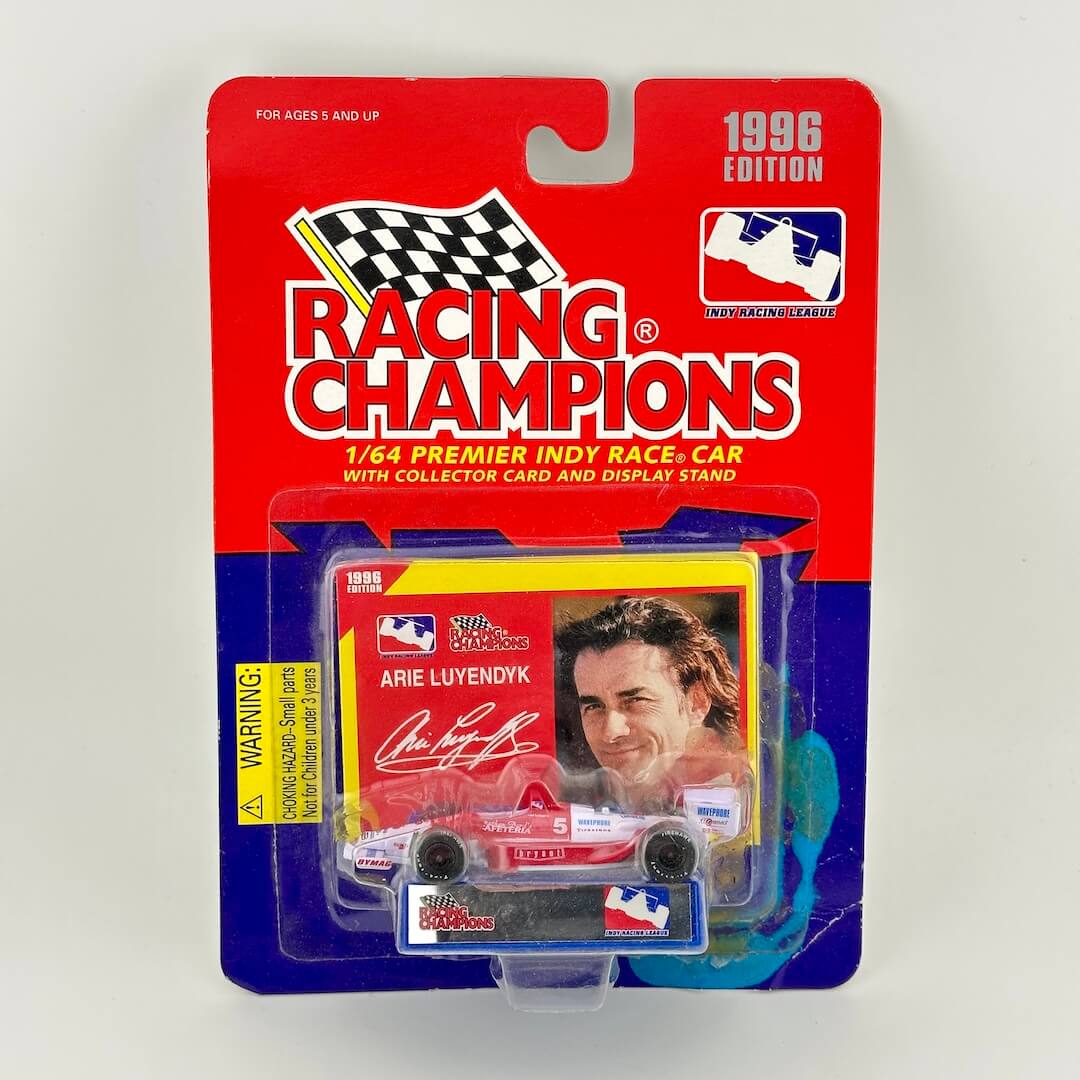 Racing Champions 1996 Indy race car model in packaging with Arie Luyendyk on the card.