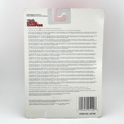Back of a toy packaging with text and a barcode on a white background