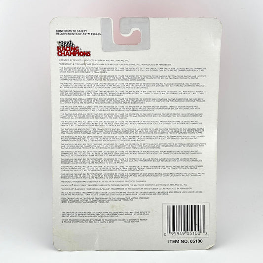 Back of a toy packaging with text and a barcode on a white background