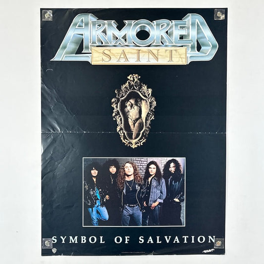 Poster of album cover for 'Symbol of Salvation' by Armored Saint with band photo and ornate design.