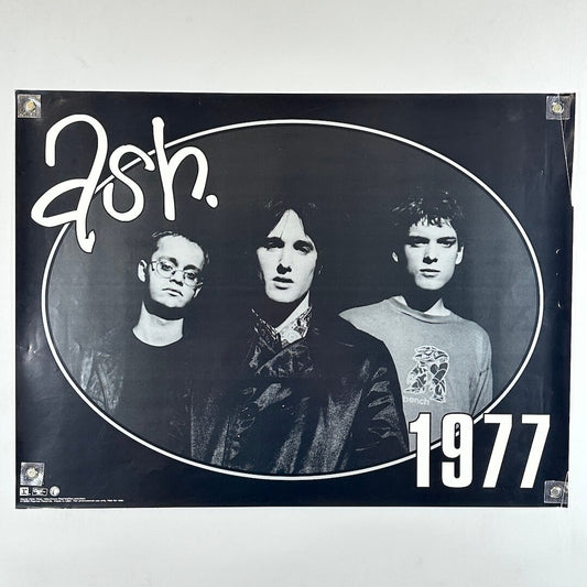 Poster of a band with 'ash.' and '1977' text on a black background