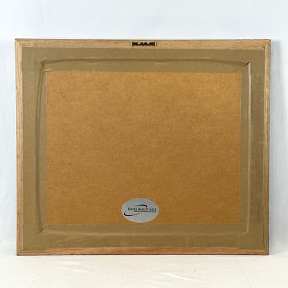 Backside of frame showing company that produced the photo and framed it.