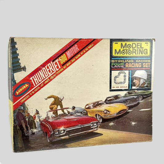 Vintage model car packaging with 'Thunderjet' and 'Aurora' branding on a white background