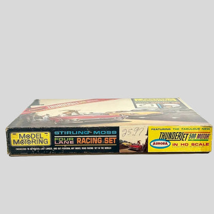 Model racing set box for Stirling Moss featuring Aurora Thunderjet 500 Motor on a white background