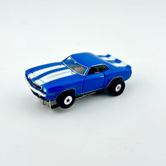 Blue toy car with white stripes on a light gray background