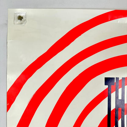 Top left corner of poster with crease by corner and at top. 
