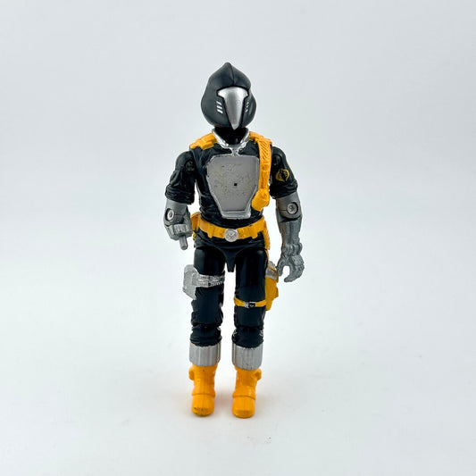 Toy figure in black and yellow outfit on a white background