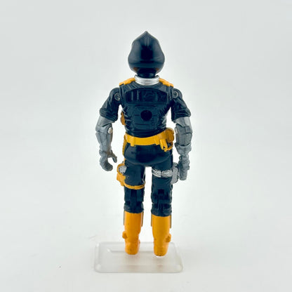 Toy figure in a black and yellow costume on a white background