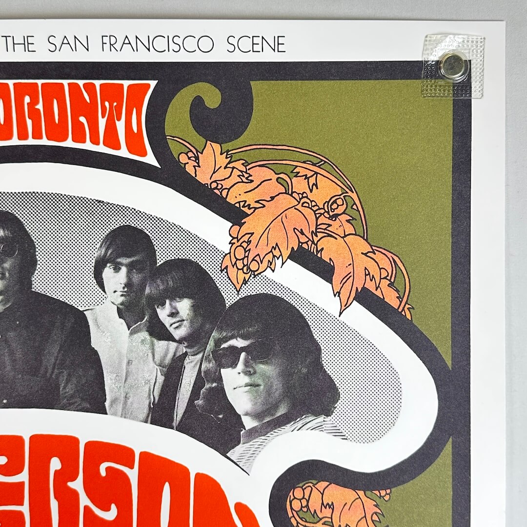 Top right corner of poster with magnet in corner. Poster shows no signs of damage or wear. 