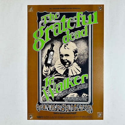 Vintage Grateful Dead poster with image of child holding a bottle of medicine in center and stylized text in green. 