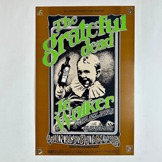 Vintage Grateful Dead poster with image of child holding a bottle of medicine in center and stylized text in green. 