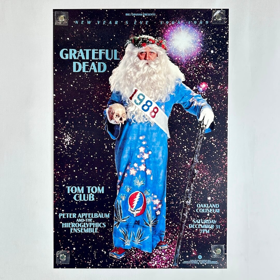 Poster for Grateful Dead concert with Father Time as central image against starry background, with text in blue around him. 