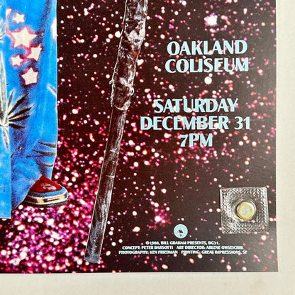 Bottom right corner of poster with no visible wear or damage held by magnet onto light surface. 
