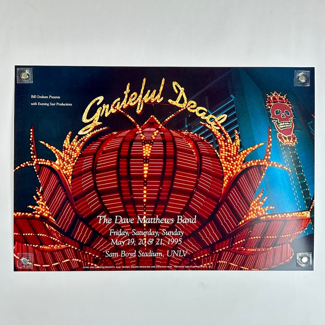 The poster features 'Grateful Dead' in large gold script over a red illuminated lantern design with blue background lighting.