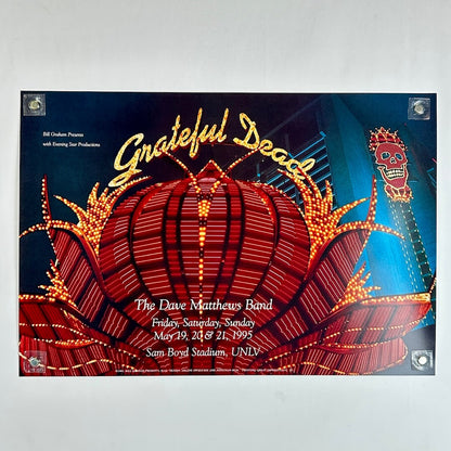 The poster features 'Grateful Dead' in large gold script over a red illuminated lantern design with blue background lighting.