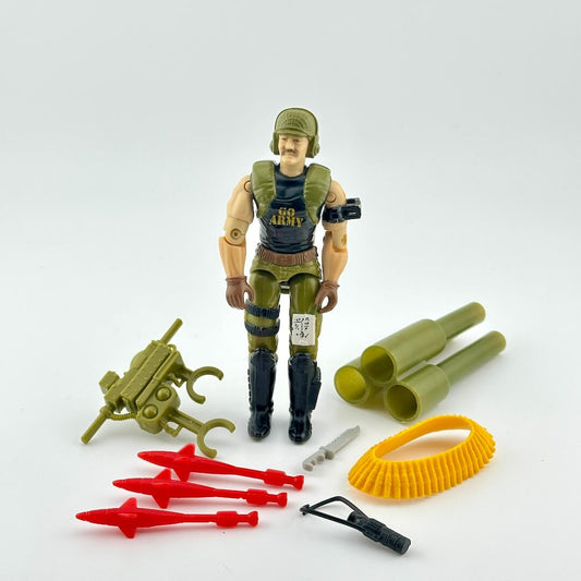 Toy soldier figure with accessories on a white background