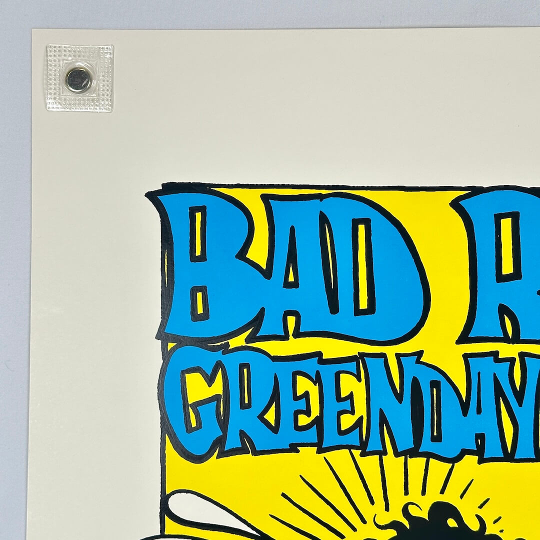 Poster with 'Bad A Green Day' text in blue and yellow on a light gray background