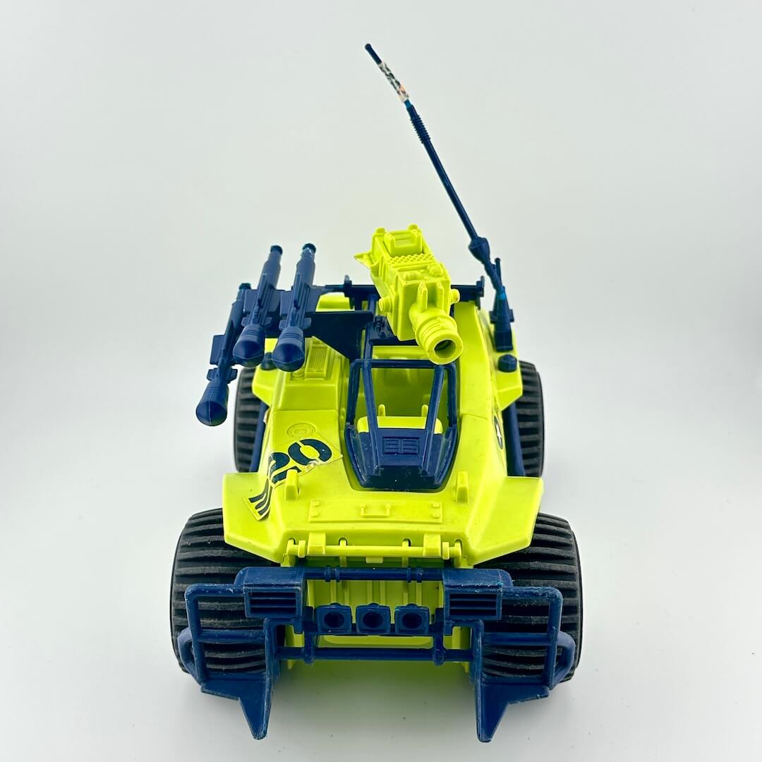 Toy vehicle with green and blue design on a white background