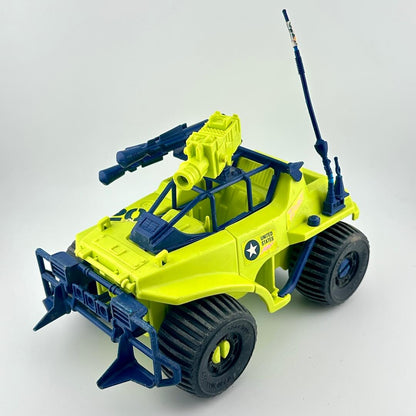Toy vehicle with green and blue design on a white background