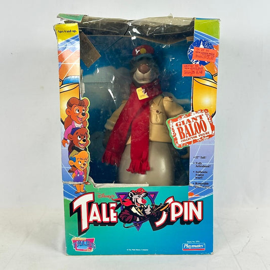 Toy figure in packaging with 'TaleSpin' branding on a white background