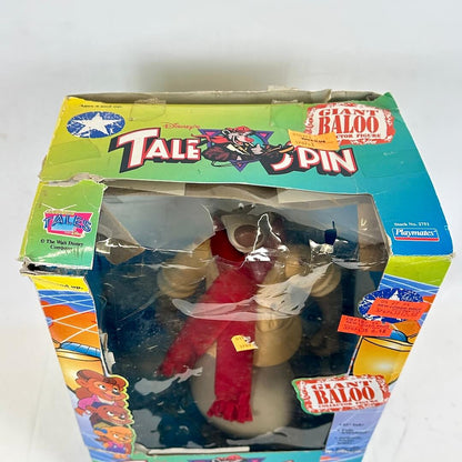 Toy figure of Baloo from 'The Jungle Book' in packaging with colorful graphics