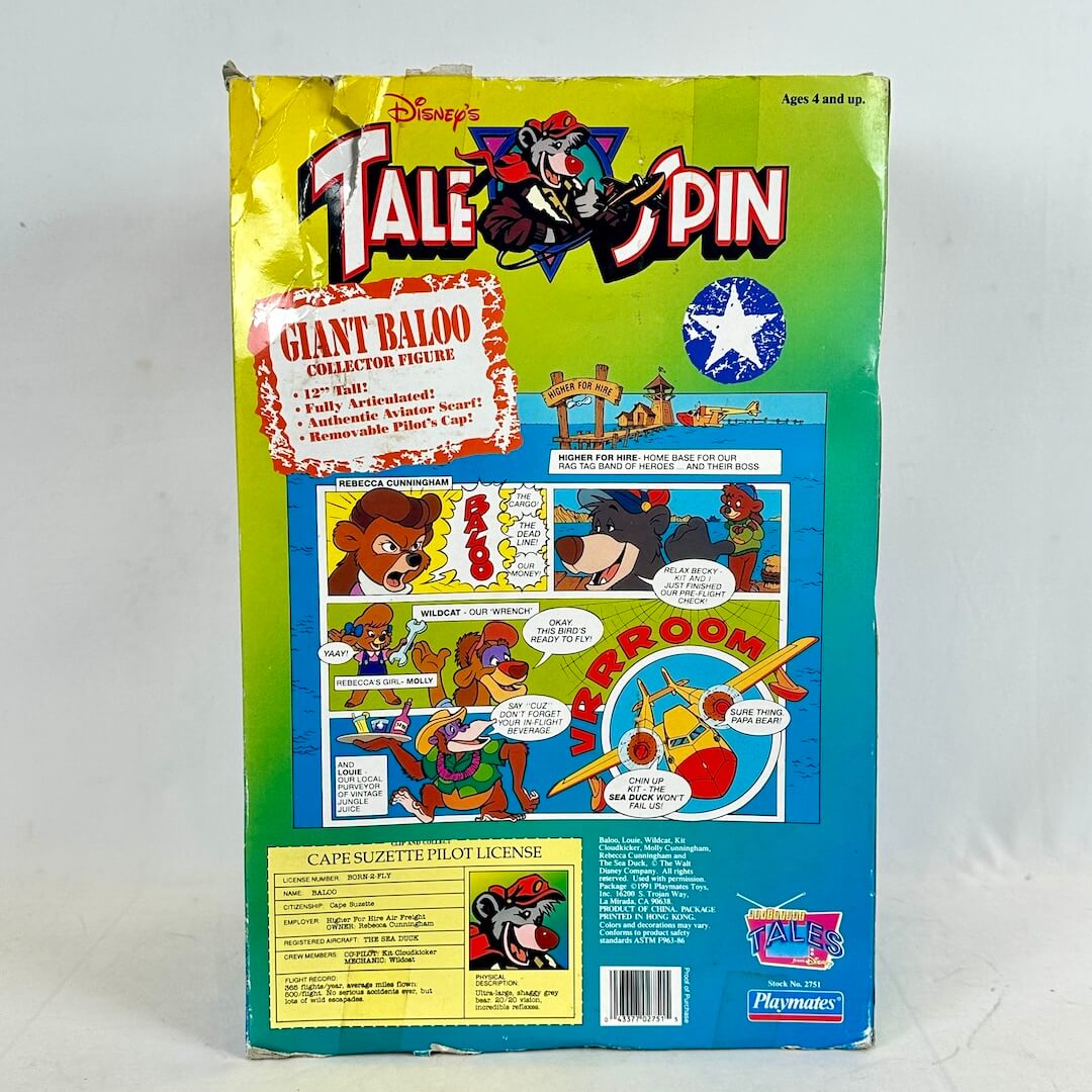 Vintage 'TaleSpin' toy box with colorful graphics and character images on a white background