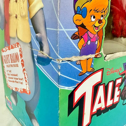 Toy figure packaging with a character and 'Tale Spin' branding