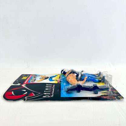 Toy figure of a superhero on a Batman-themed packaging against a white background