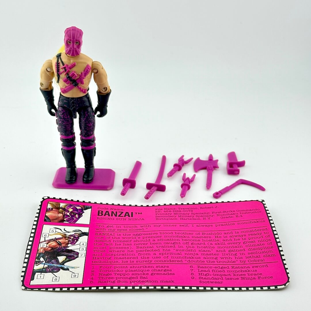 Toy figure with accessories and a card on a white background