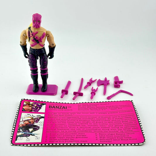 Toy figure with accessories and a card on a white background