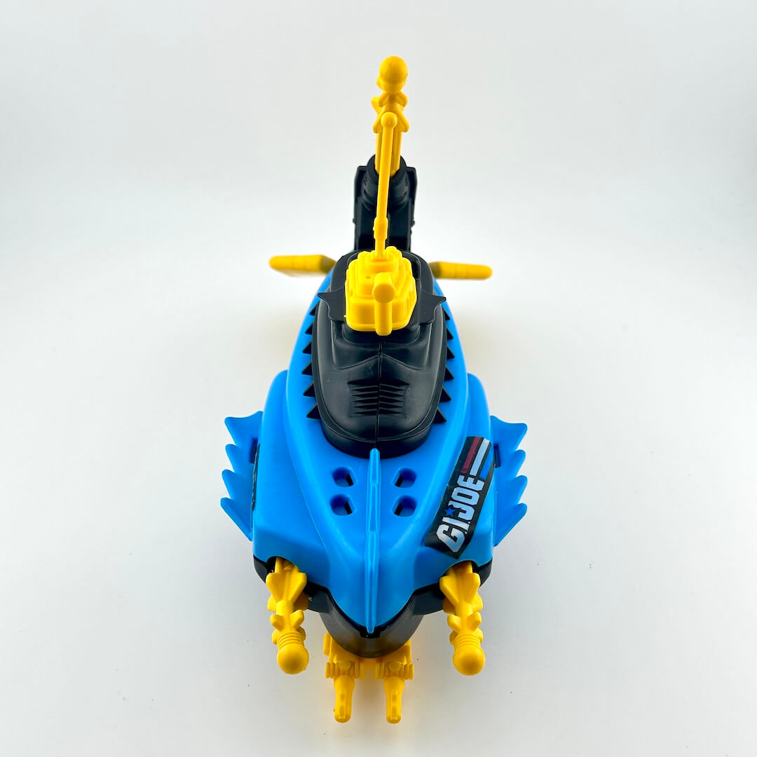 Toy submarine model with yellow periscopes and antennas on a white background