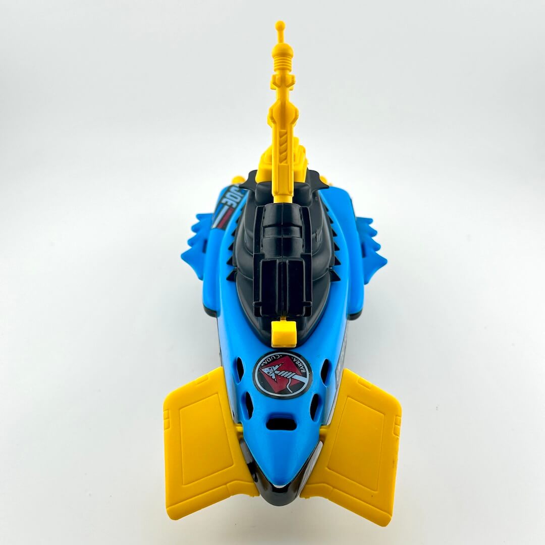Toy submarine model with yellow periscopes and antennas on a white background
