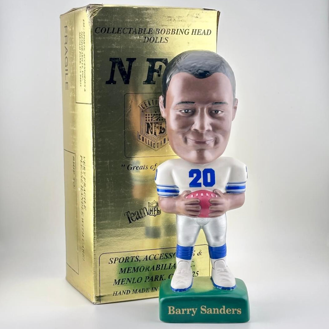 Bobblehead figure of a football player with a box labeled 'NFL' in the background.