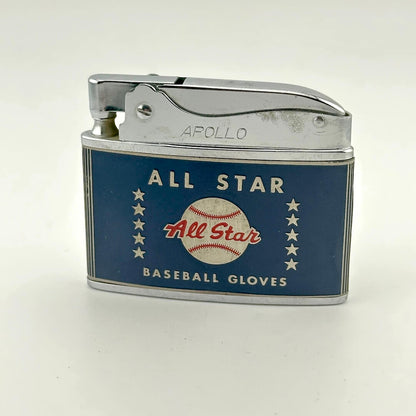 A vintage Apollo lighter with a blue enamel faceplate featuring 'ALL STAR BASEBALL GLOVES' text.