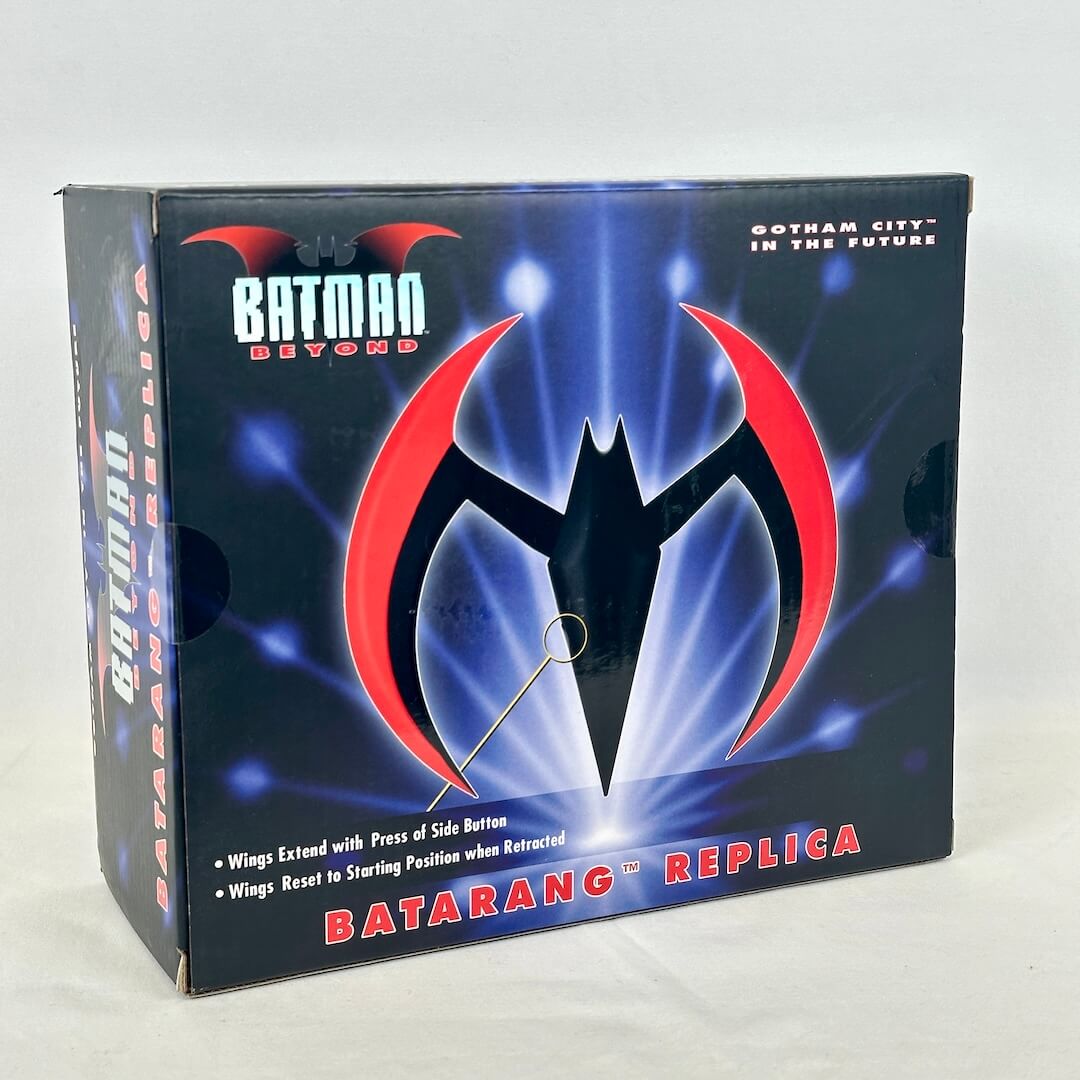 A boxed Batman Beyond Batarang Replica toy set shown at a slight angle. The retail box features the Batman Beyond logo.