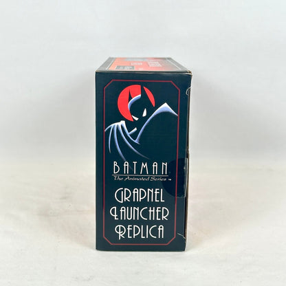 A boxed replica product for Batman: The Animated Series, featuring a black box with Batman series logo. 