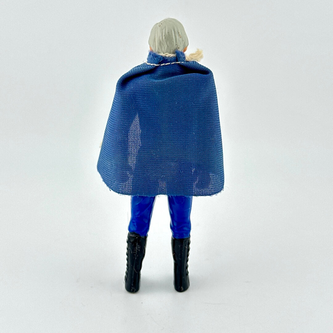 Action figure with a blue cape and pants on a white background