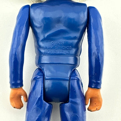 Blue action figure with 'UNIV. STUDIOS HONG KONG' branding on a white background