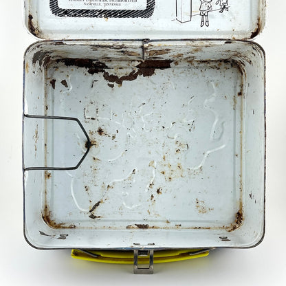 View of interior of vintage metal lunchbox with rust spots and clip for thermos. 