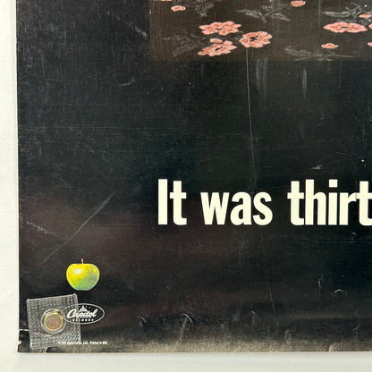 Bottom left corner with creases and dents. 