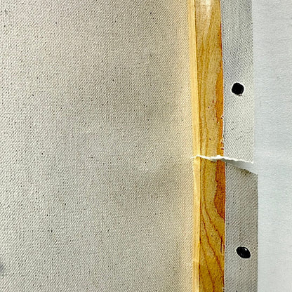 Middle of right side with quarter inch tear