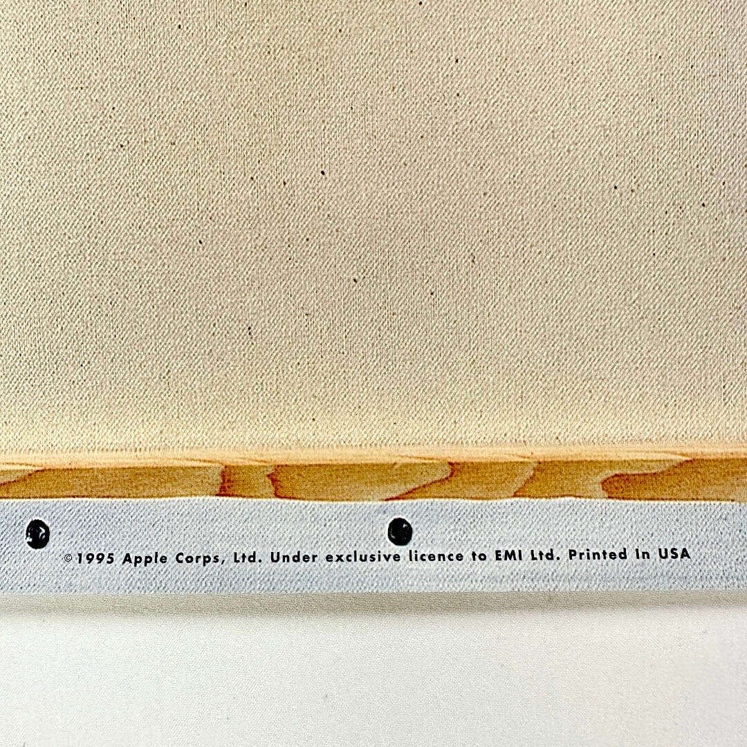 Bottom center of poster with promo and copyright information.