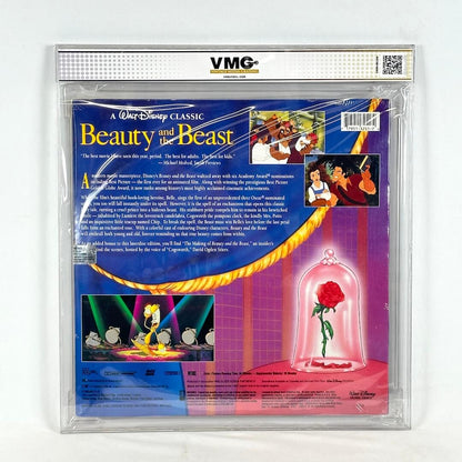 Disney 'Beauty and the Beast' laserdisc packaging with rose under glass dome illustration.