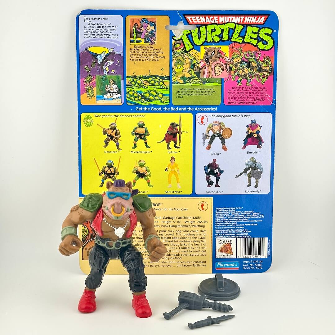 Action figure of Bebop with three accessories and card back on white background. 