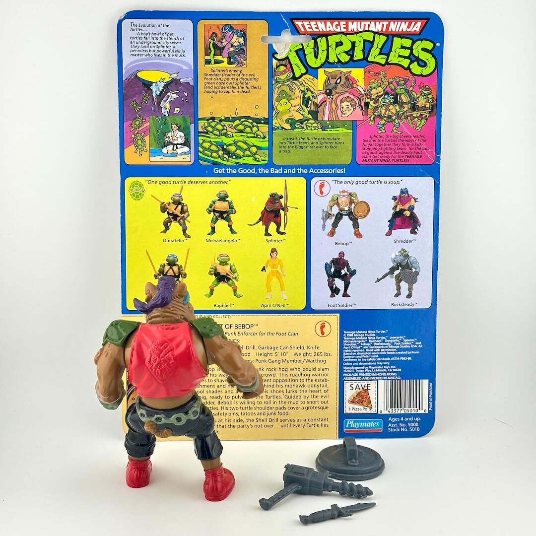 Action figure of Bebop with three accessories and card back on white background. 